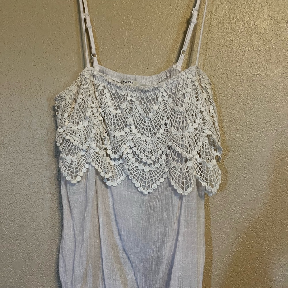 Large white Tank Top.